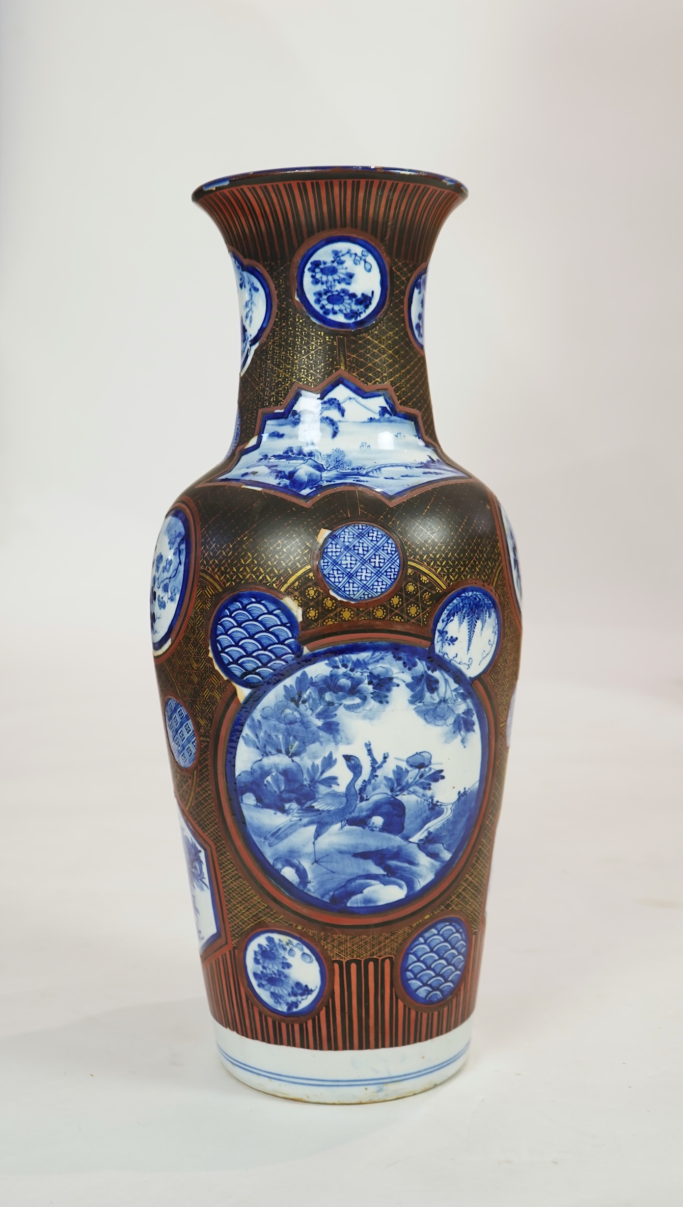 A large Japanese blue and white and gilt lacquered vase, late 19th century